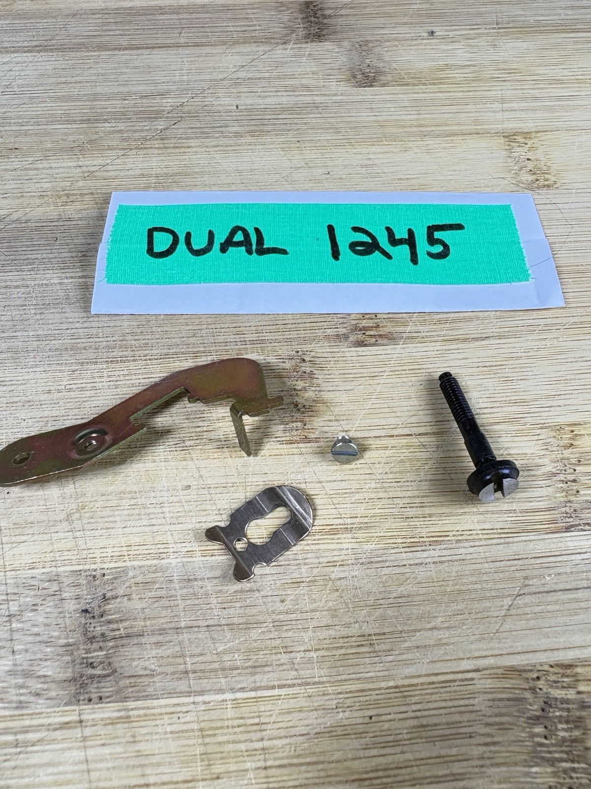 Dual 1245 Part (possibly 1246/1249/1237/1241): main lever trip mechanism